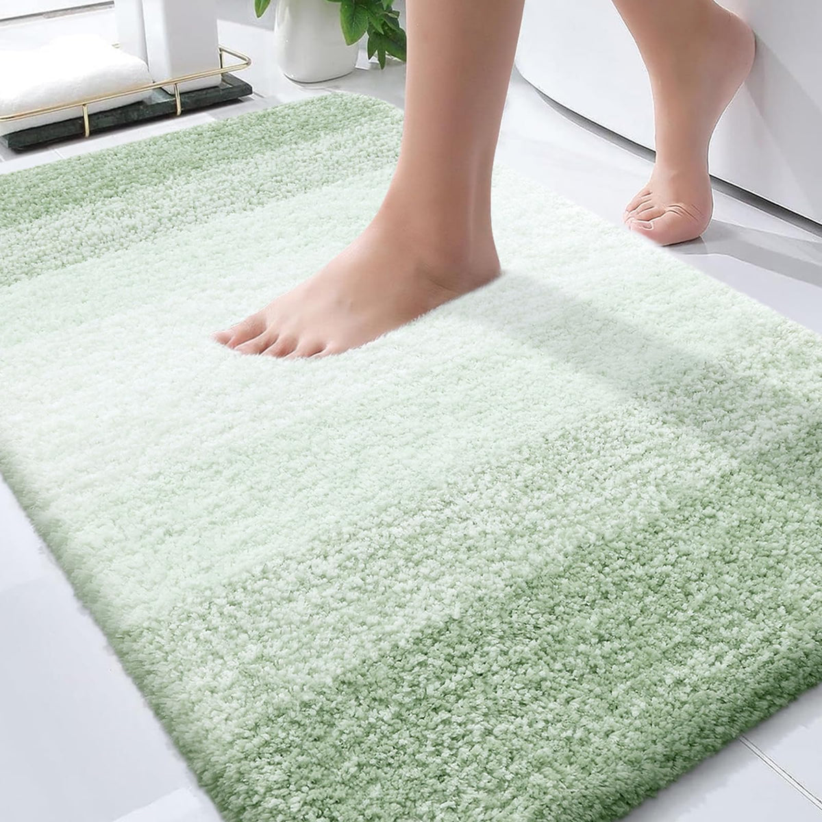 OLANLY bathroom mat with soft plush pile in sage green for warm feet.