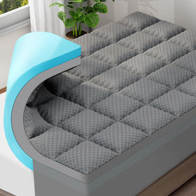 OLANLY dual-layer topper on a queen bed for refreshed comfort.