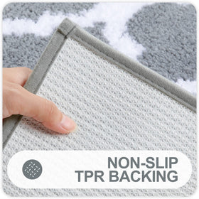 OLANLY non-slip backing keeps mats in place on smooth bathroom floors