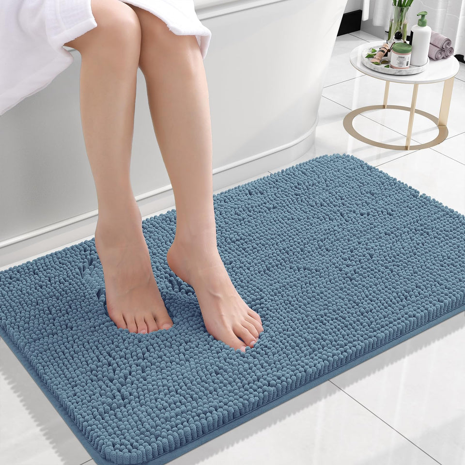OLANLY small bathroom rug 24x16 in airy blue, plush warmth underfoot for daily routines.
