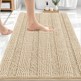 OLANLY thick bath rug 30x20 in beige offers plush comfort underfoot.