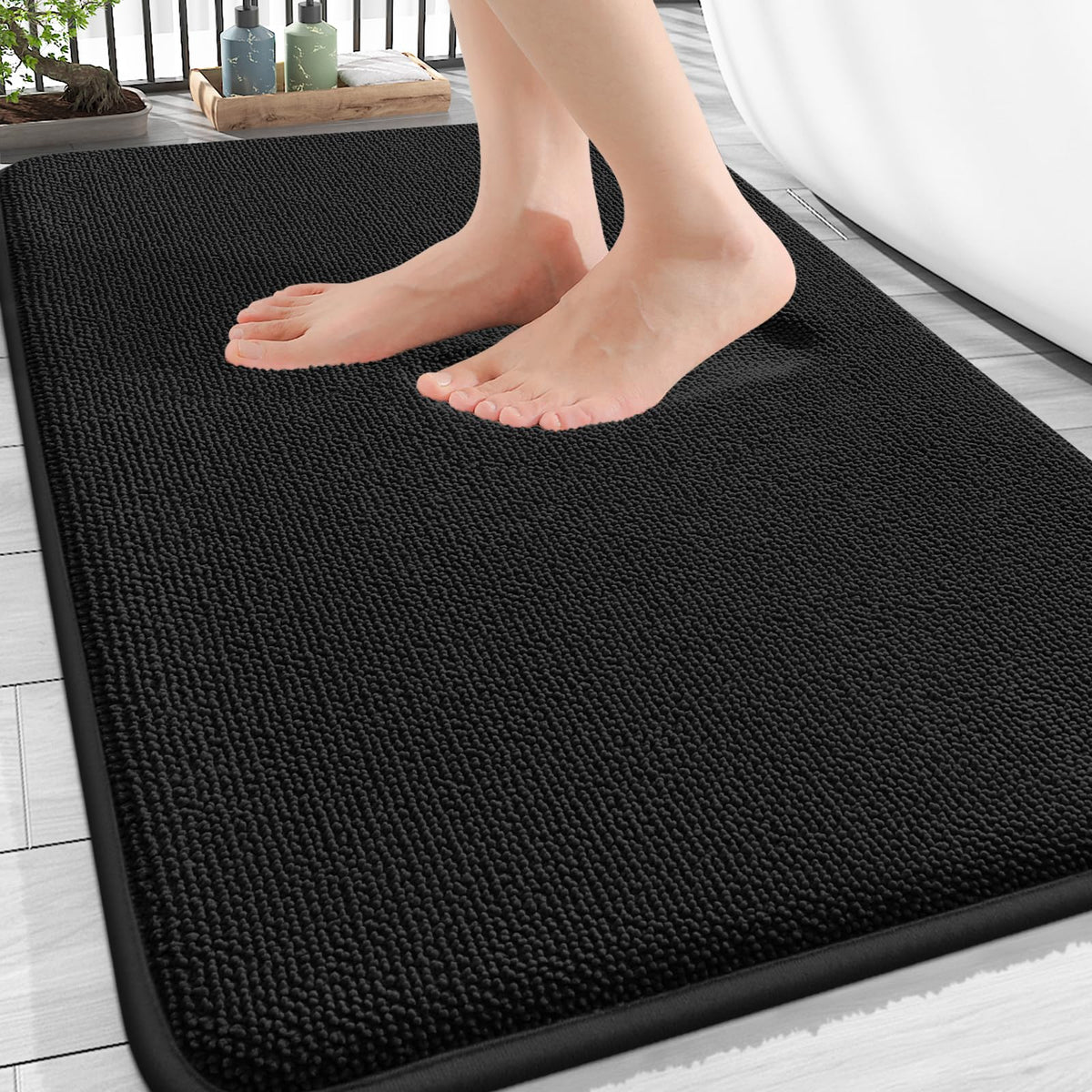 OLANLY thick memory foam bath mat 30x20 provides plush underfoot comfort.