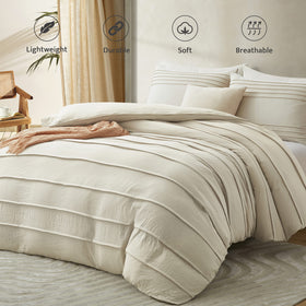 Oli Anderson beige duvet cover pleated texture close-up shows premium fabric.