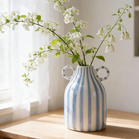 oliruim ceramic vase with blue and white stripes and handles, a chic coastal centerpiece