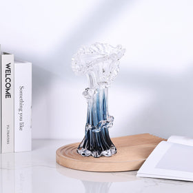 oliruim ocean-wave blue glass vase highlights artistry and creates a focal point on shelves.