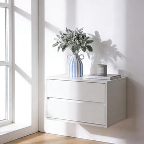 oliruim vase displayed on a bookshelf elevating cozy decor