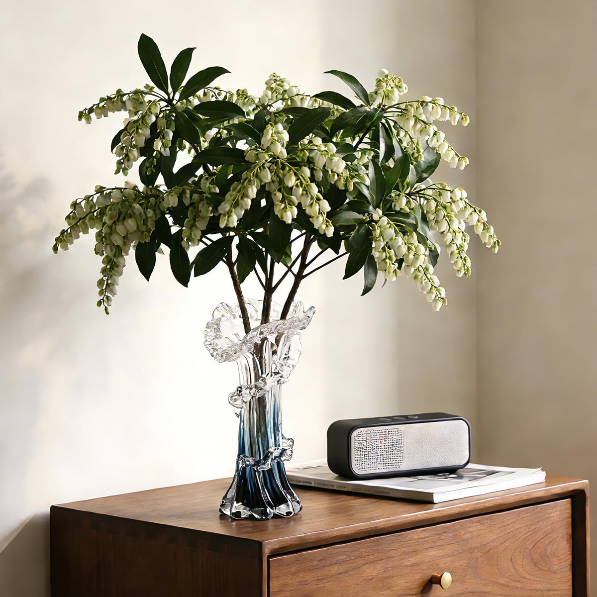 oliruim vase for floral arrangements showcases blooms with elegant ocean-inspired color.