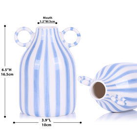 oliruim vase on kitchen table as a minimalist centerpiece with sea-tones
