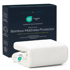 Olive + Crate waterproof mattress pad protecting the bed from spills and stains