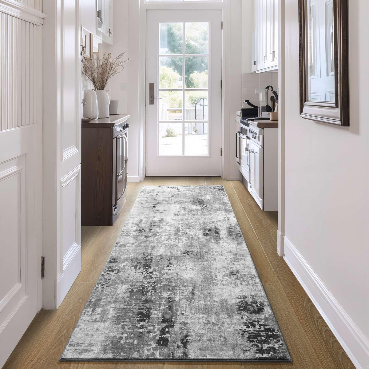 Ompaa soft gray rug adds warmth to hallways, kitchens, and bedrooms.