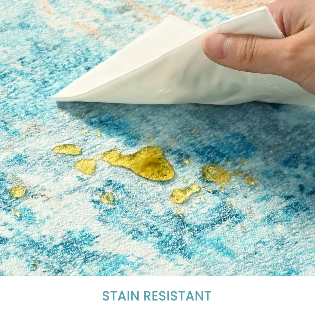 Ompaa teal blue kitchen area rug helps define spaces.