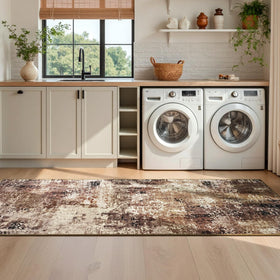 Ompaa low-pile rug fits under furniture and works with robotic cleaners.