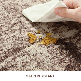 Ompaa abstract rug adds stylish charm to entryways without sacrificing practicality.