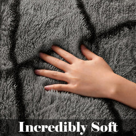 ONASAR area rug offers soft plush for a comfortable living room.