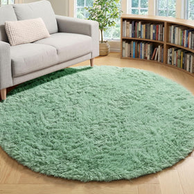 ONASAR sage-green round rug 4ft adds cozy softness to kids' rooms.