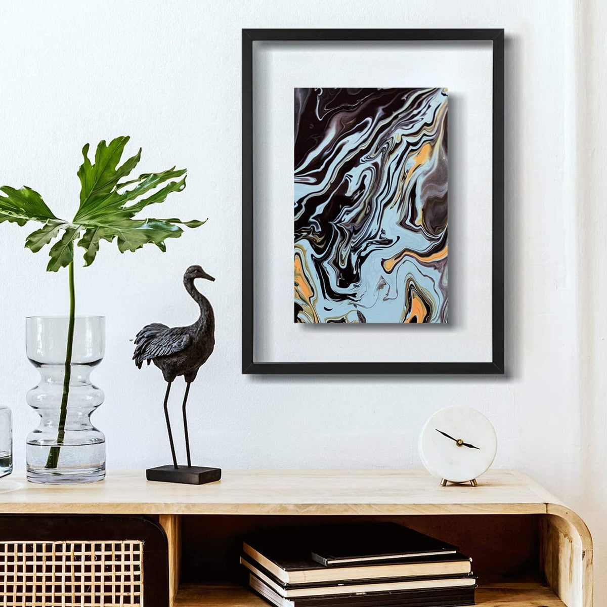 One Wall frame accommodates 11x14 or 16x20 photos for varied floating effects.