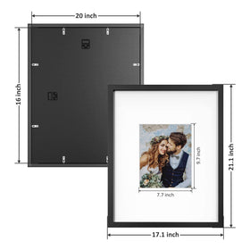 ONE WALL black pine wood frame mounted on wall showing vertical orientation.