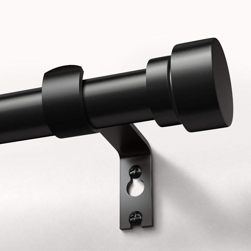 Oneach heavy-duty curtain rod set with 1-inch outer bars supports thick blackout drapes.