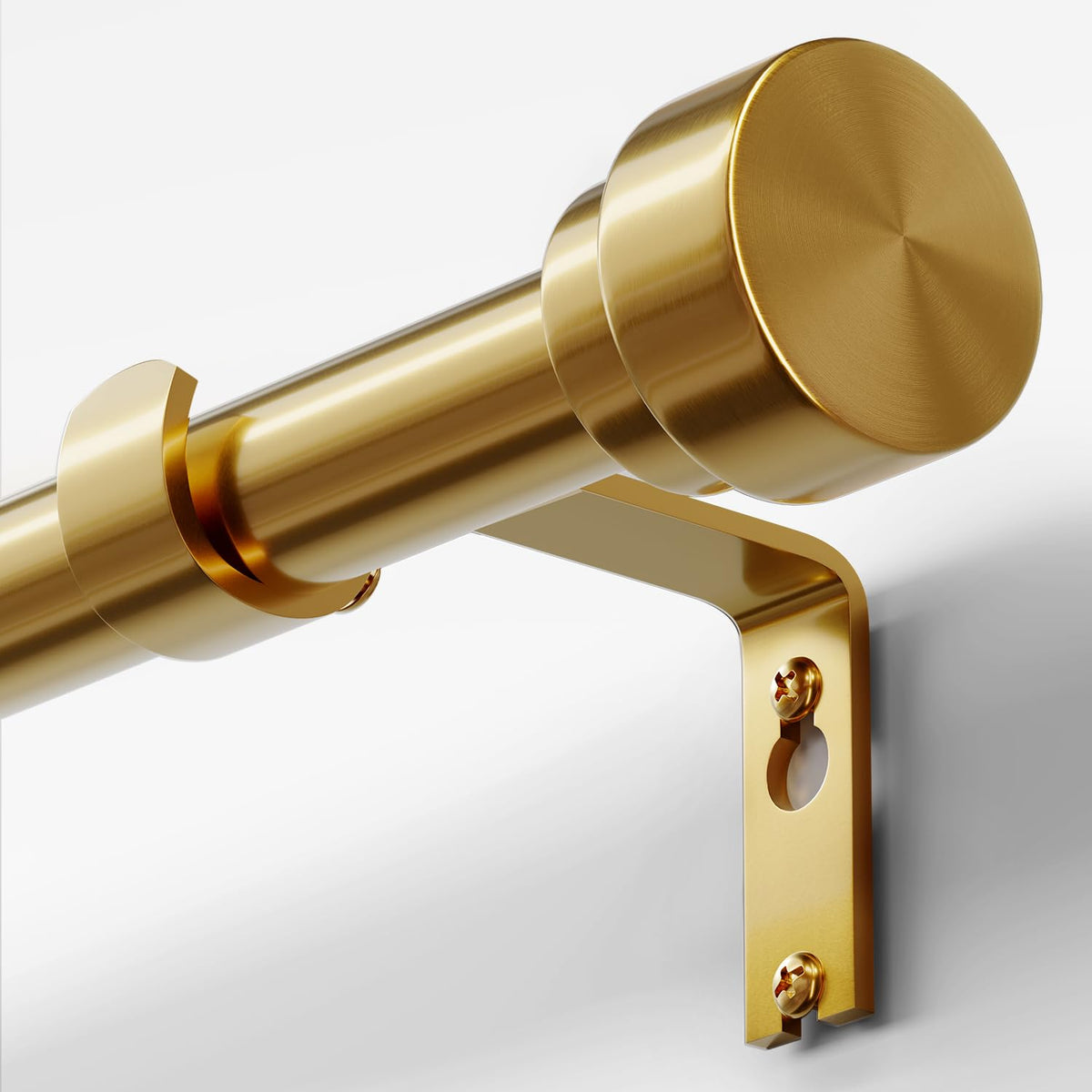 Oneach heavy duty curtain rod close-up showing metal finials with brass gold finish.