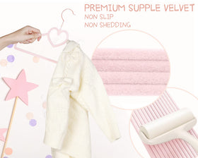 OneDream pink velvet hangers are notched for better garment fit and organization