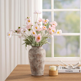 OOIT vase with dried flowers, coordinated colors for a cohesive look.