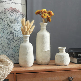OOIT dried-botanicals display in rustic vases adds texture