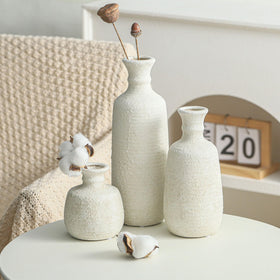 OOIT whitewashed vases framed in entryway vignette with neutral charm