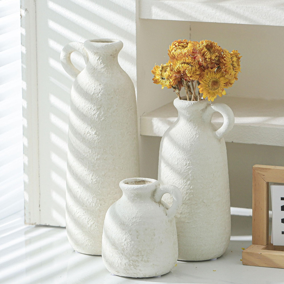 OOIT ceramic vase set of 3 with handle, dried stems complement neutral glaze.