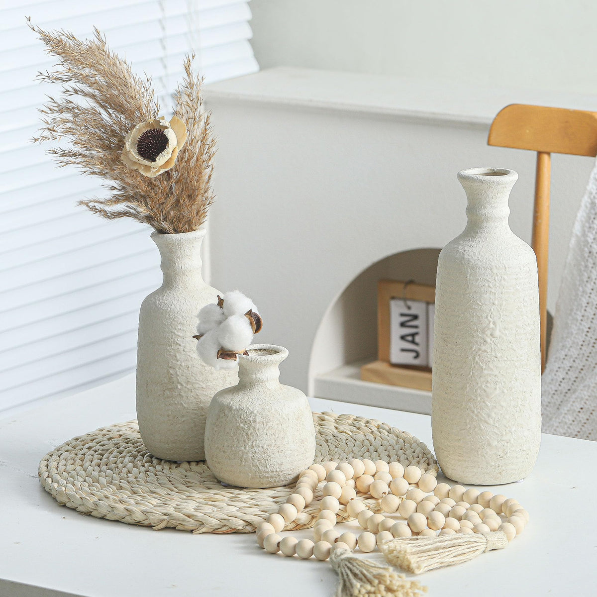 OOIT neutral vases on a console project boho farmhouse vibes