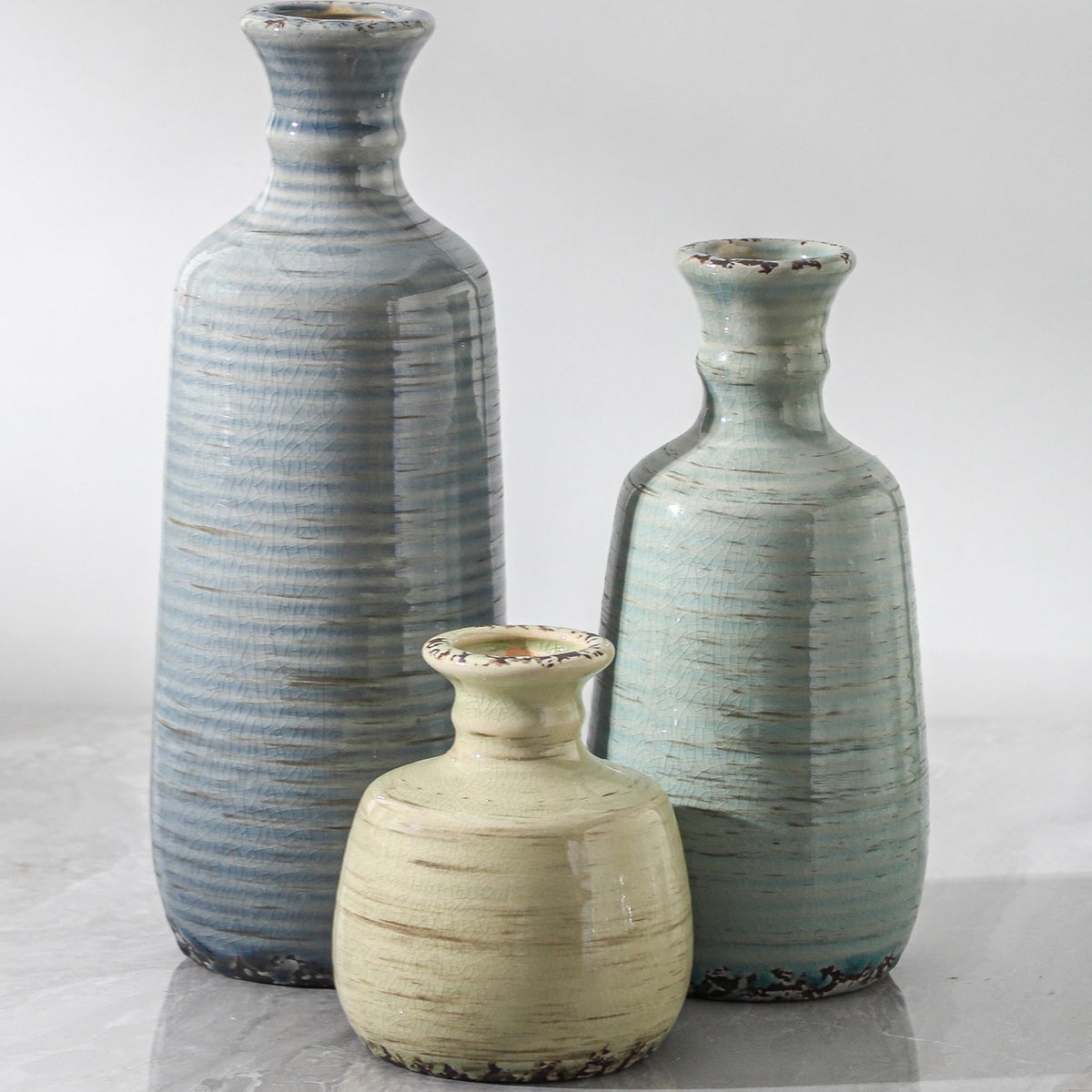 OOIT ceramic vase set of three in rustic neutral finish for stylish home decor