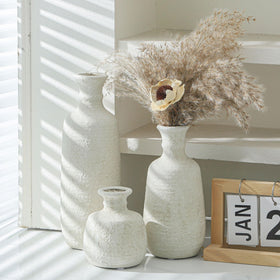 OOIT ceramic vases closeup highlights textured terra cotta finish