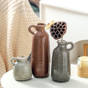 Waterproof interior coating supports fresh or dried plant displays.
