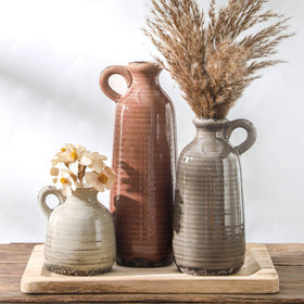 OOIT ceramic vase with handle in neutral rustic glaze for mantel display.