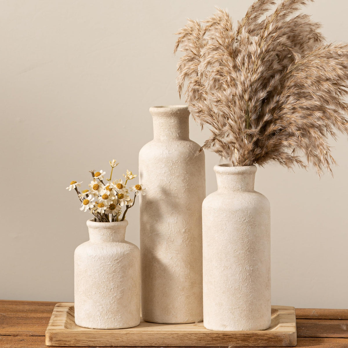 OOIT ceramic vases bring clean lines to bookshelves and mantels.