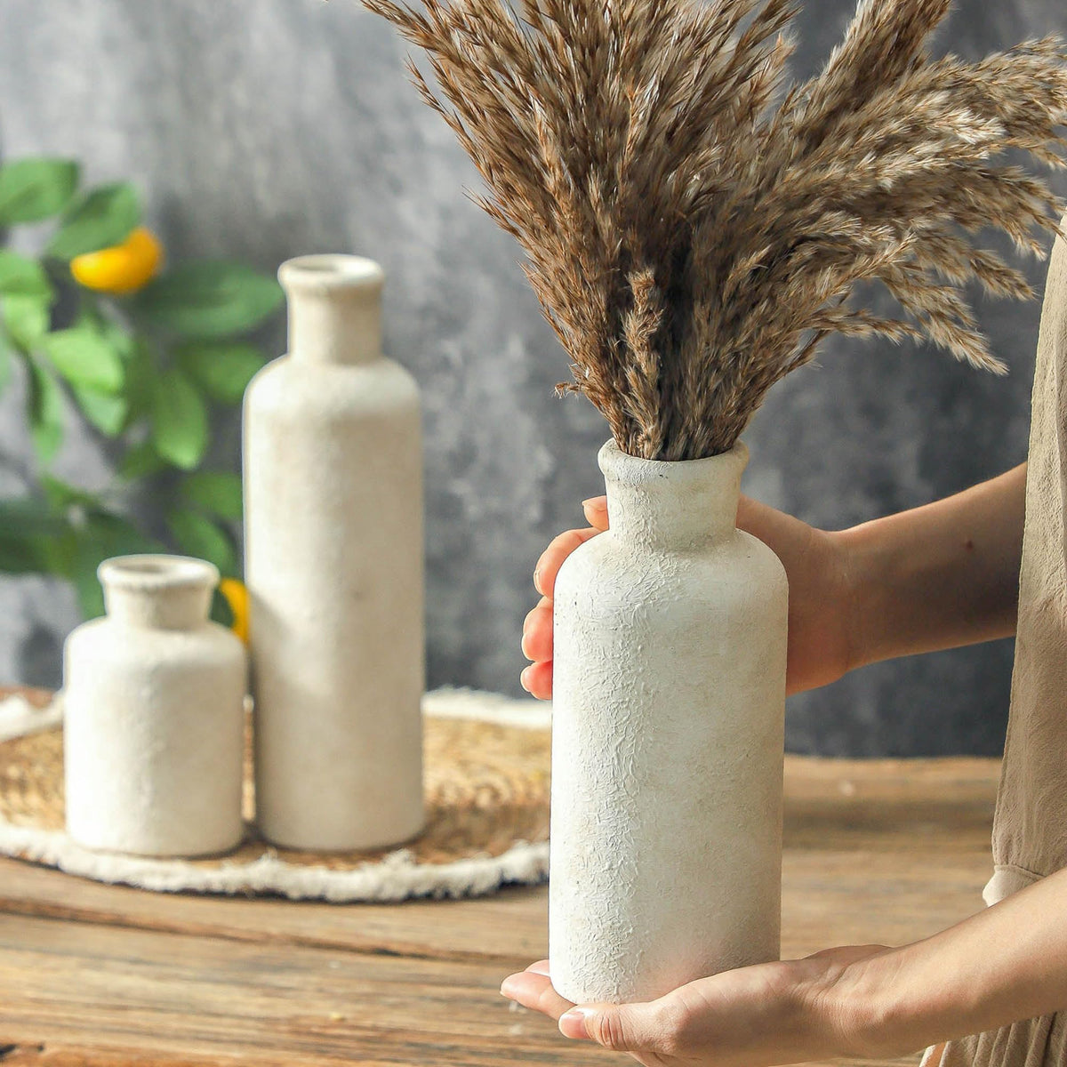 OOIT whitewashed vases add elegance to entryways and mantels.