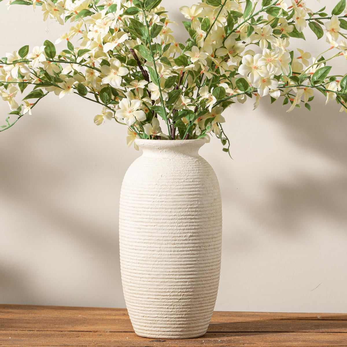 ooit ceramic flower vase in white glaze; perfect for fresh or artificial arrangements.
