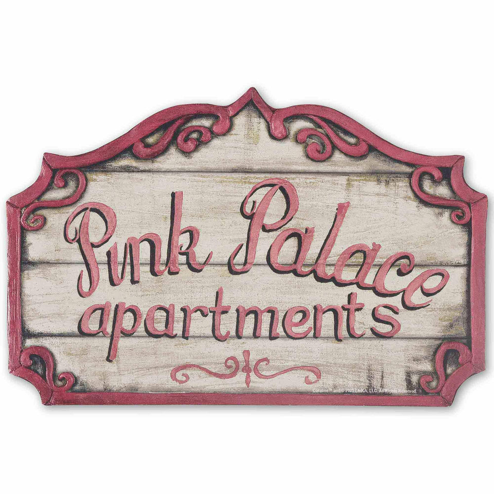 Open Road Brands Coraline Pink Palace sign with distressed wood adds vintage charm to entryways.