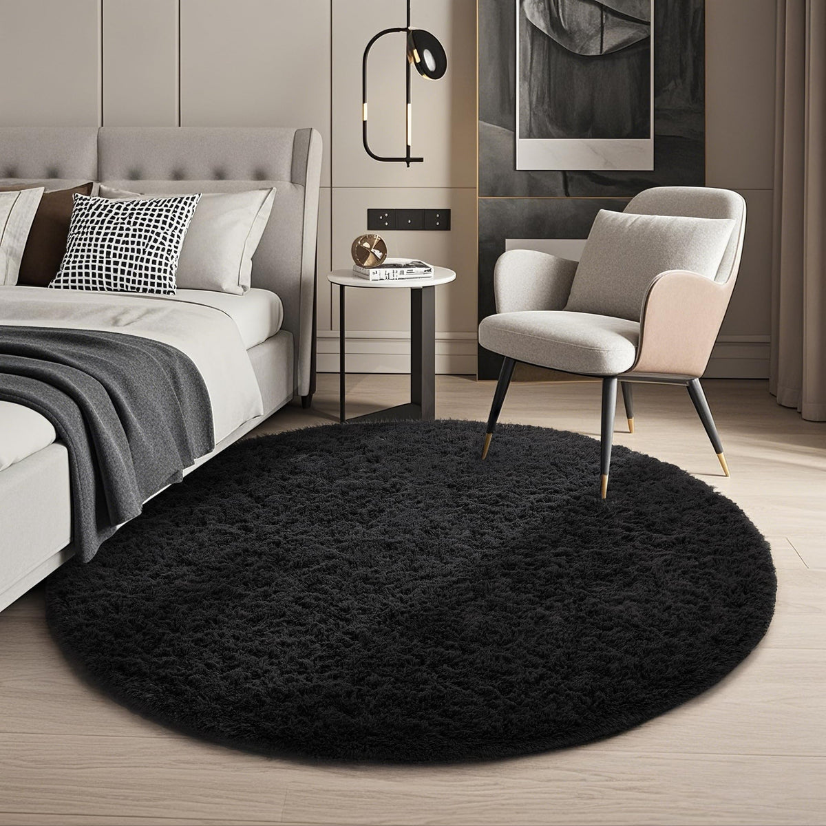 Ophanie 4ft round black rug with plush shaggy texture ideal for cozy living spaces