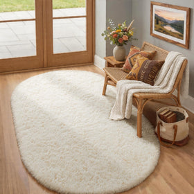 Ophanie 4x6 oval ivory rug at bedside adds soft warmth for barefoot mornings