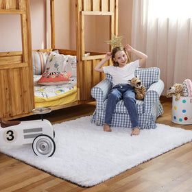Ophanie baby tummy time rug supports safe, comfortable play.
