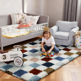 Ophanie checkered rainbow rug for kids room offers plush comfort during active play