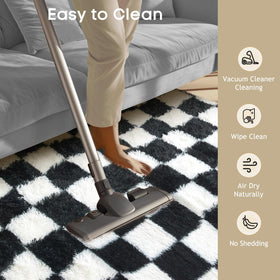Ophanie checkered rug in a nursery or playroom for kid-friendly decor.