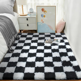 Ophanie checkered rug closeup highlighting plush pile and soft texture.