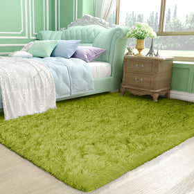 Ophanie Green Rug playroom-friendly surface supports little footsteps.