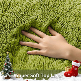 Ophanie Green Rug grass 4x6 in nursery for soft tummy time.