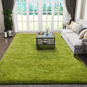 Ophanie green living room rug 5x8 offers plush comfort and warm aesthetic.