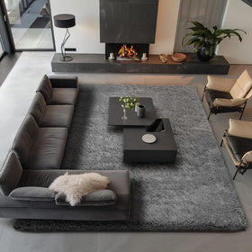 Ophanie modern grey shag rug creates a cozy space in any room.