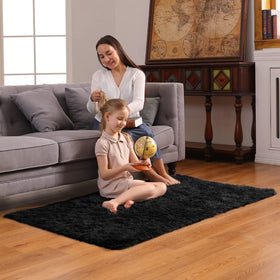 Ophanie non-slip dot bottom keeps rug in place on smooth floors