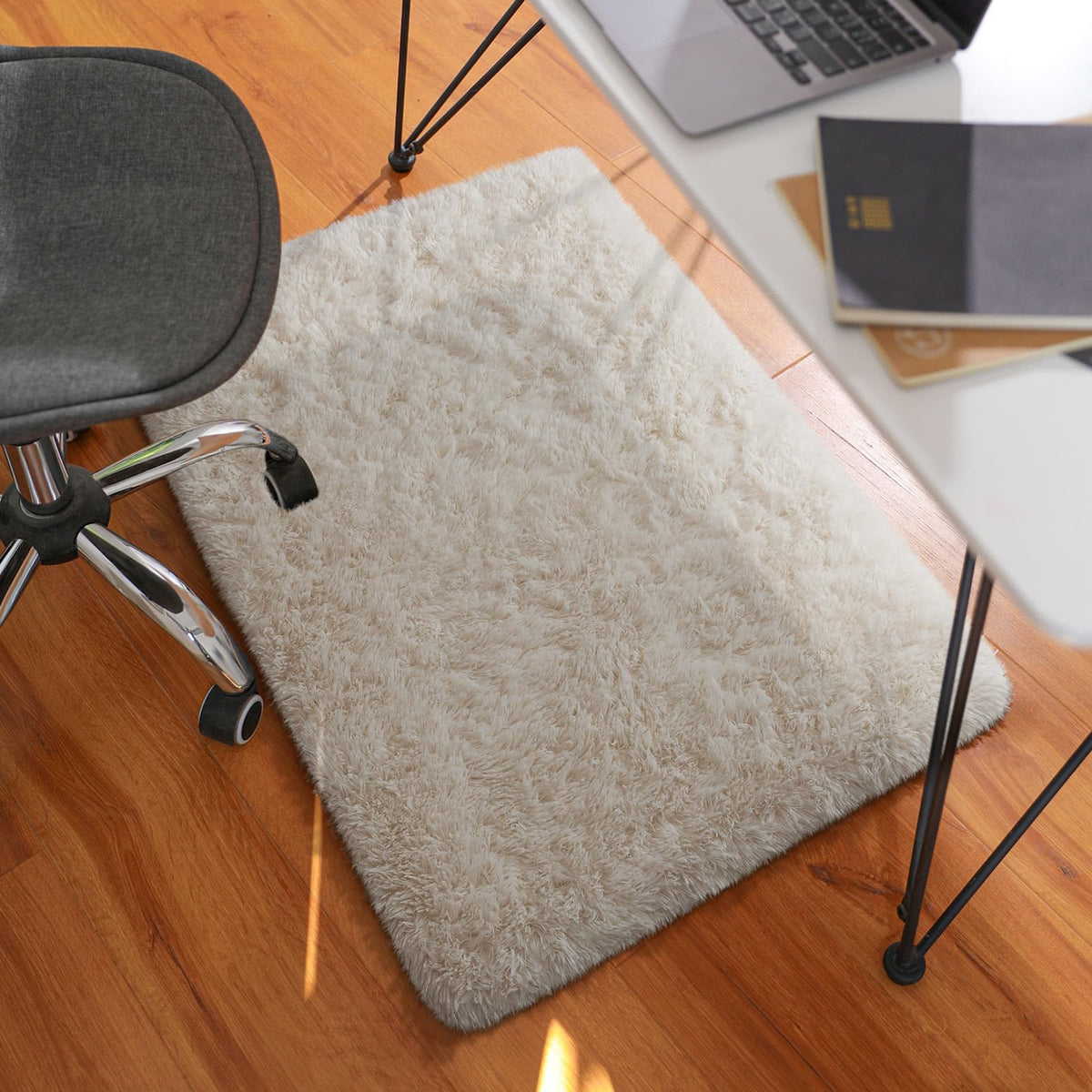 Ophanie nursery-friendly rug supports tummy time and soft landings.