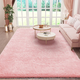 Ophanie pink area rug in bedroom view showing warm texture and inviting softness